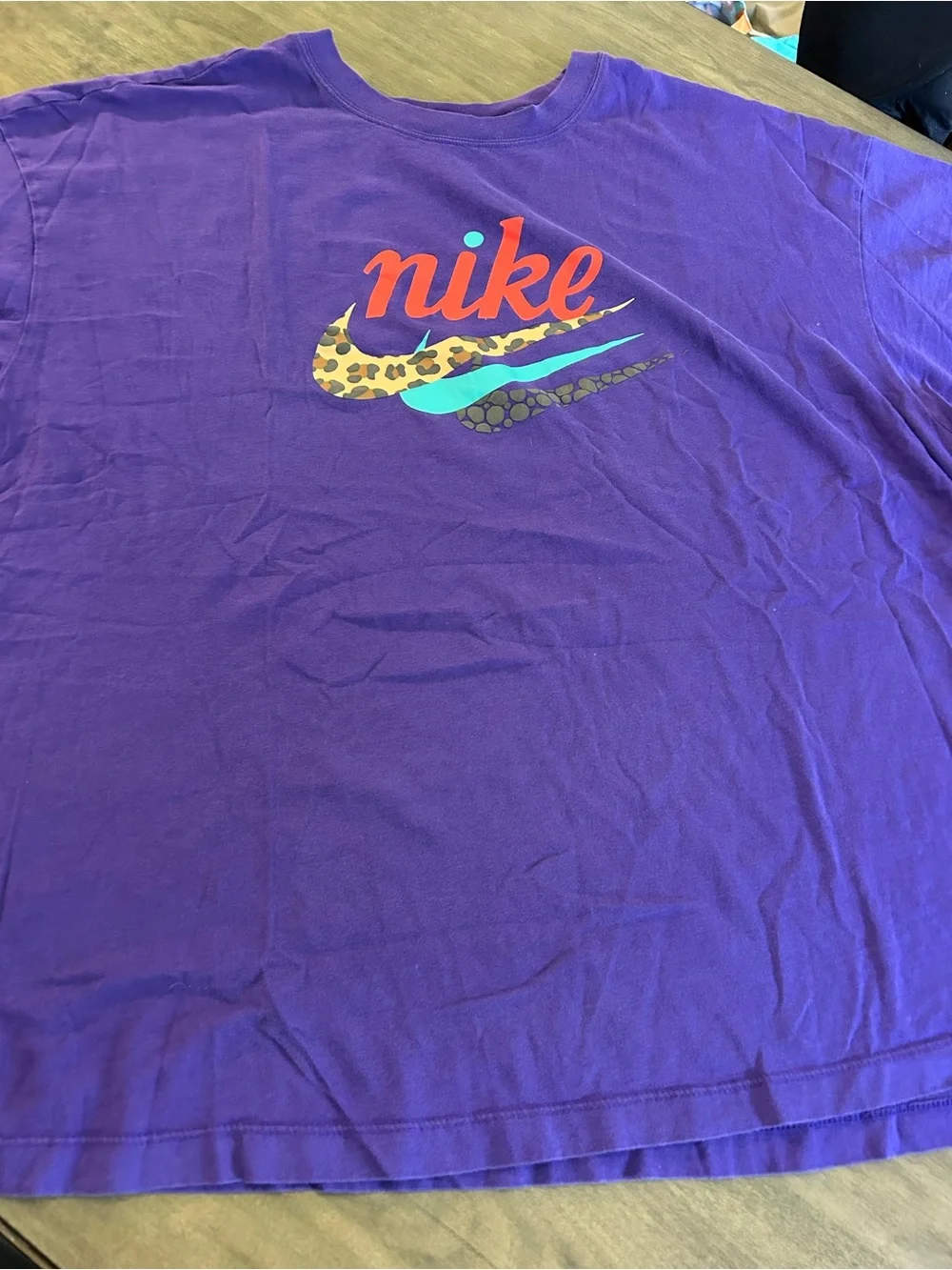 Nike Purple Tee with Red Script and Multicolor Swooshes